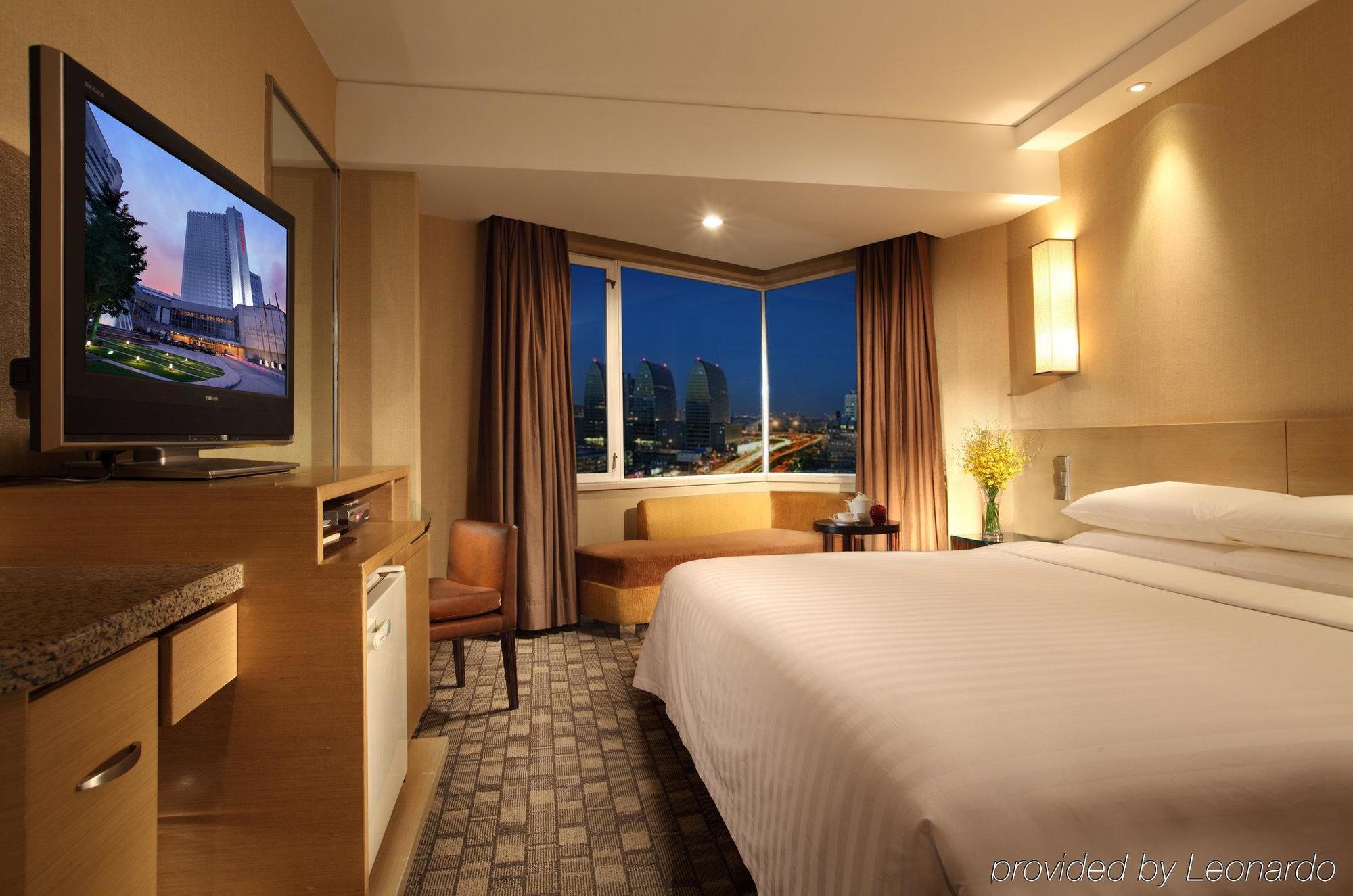 Beijing New Century Hotel Bagian luar foto